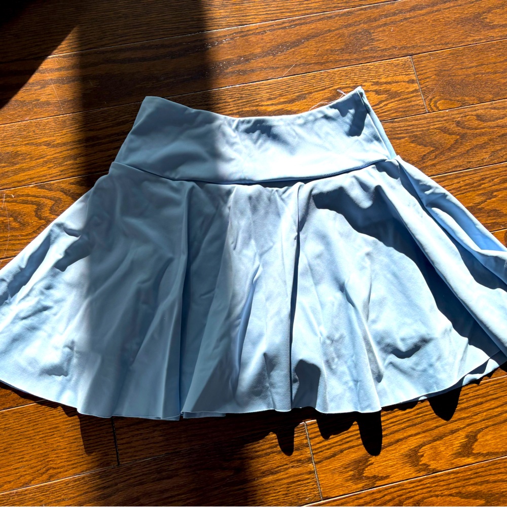 Blue athletic skirt with built in shorts